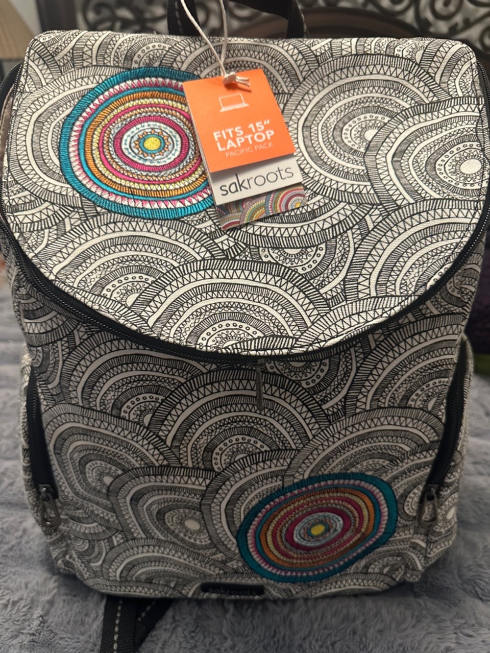 Sakroots Black & White Patterned Backpack with Colorful Circular Embroidery